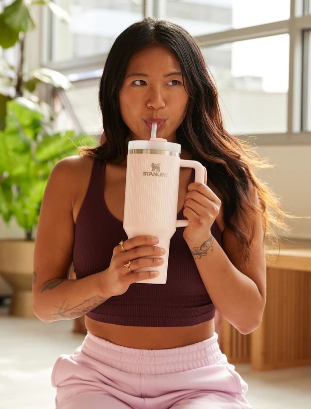 Influencer posing with Stanley Quencher