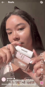 Glossier customer-generated video content transformed into shoppable clips on social media.